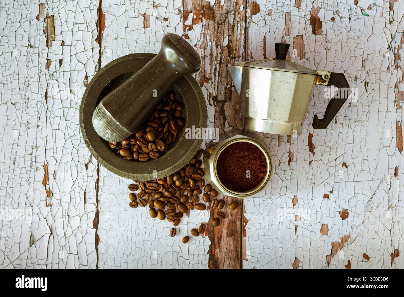 coffee beans, ground with a mortar and mocha, traditional Italian