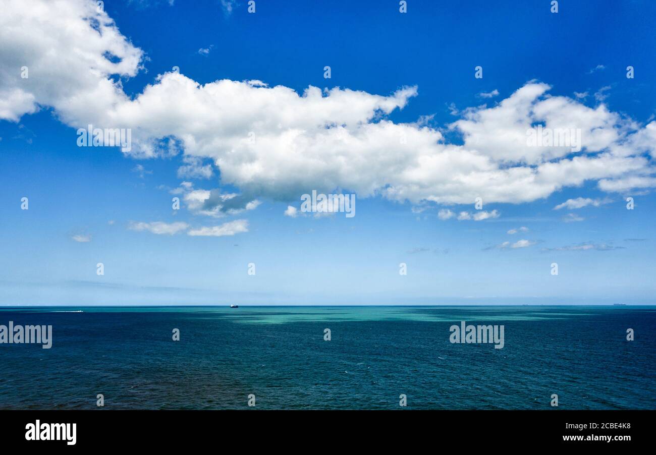 The English Channel on a fine summer day, seen from the Kent coastal path (or Saxon Shore Way) above the cliffs near Kingsdown, south of Deal, UK Stock Photo