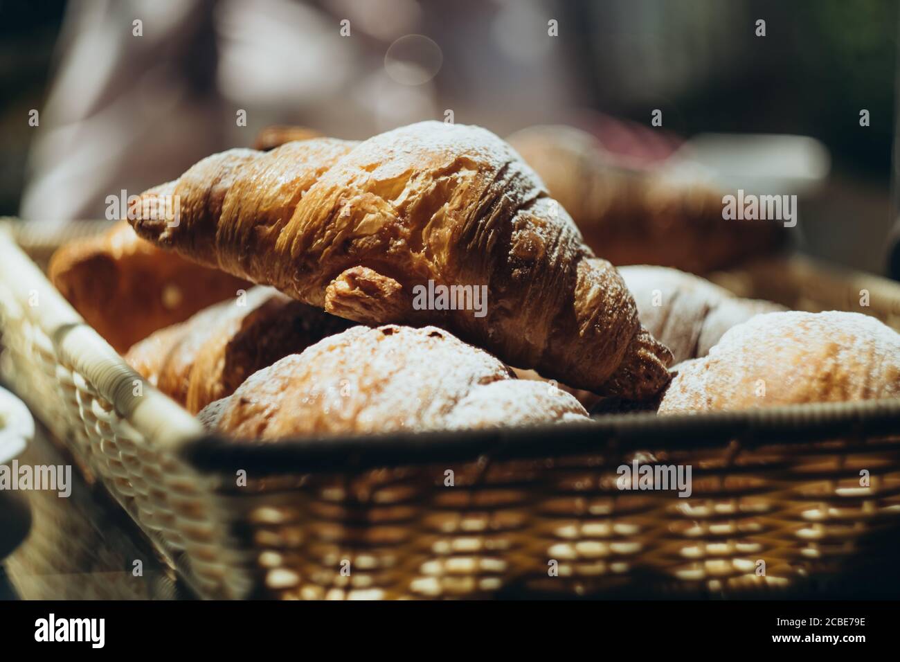 croissants in a wicker basket Stock Photo