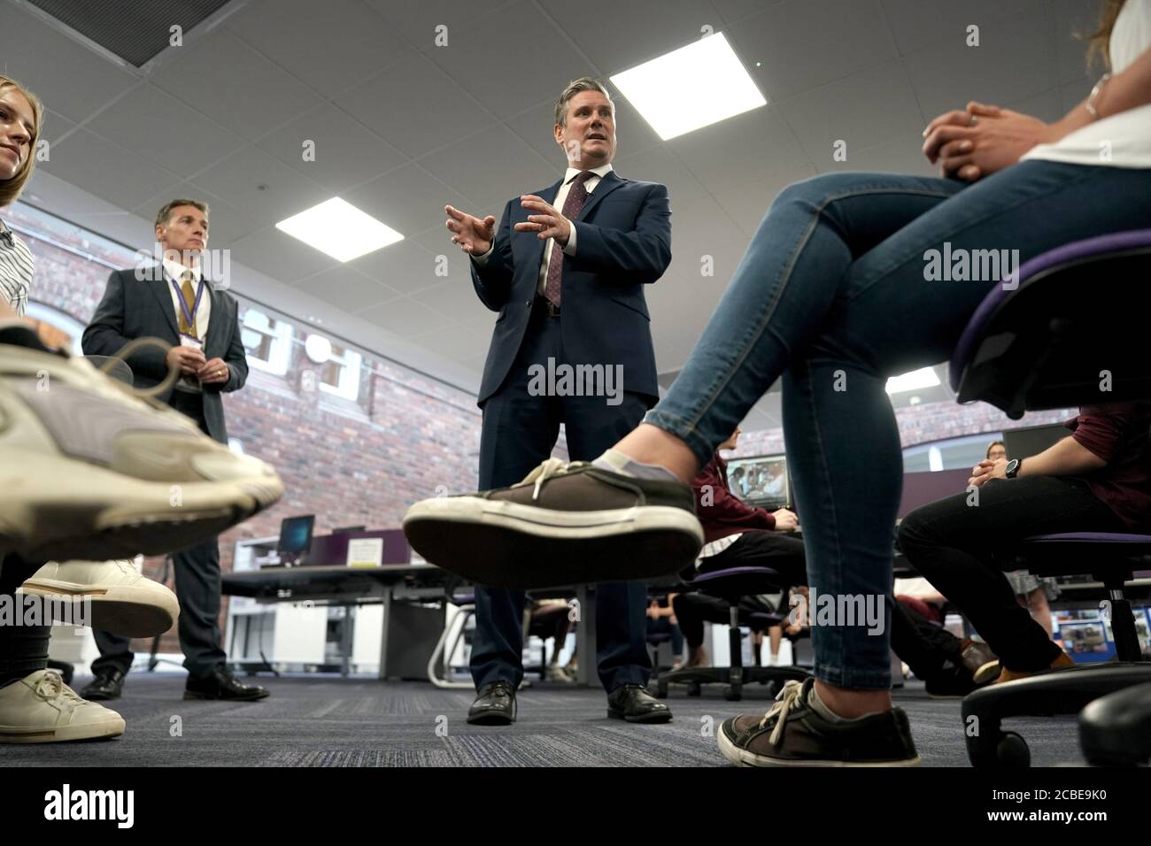 Labour leader Sir Keir Starmer talking to students at Queen Elizabeth Sixth Form College, Darlington, after they received their A-Level results. Stock Photo