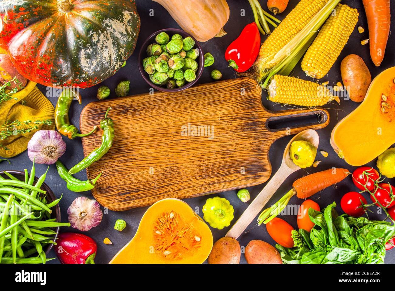 Autumn Cooking Background Organic Autumn Harvest Vegetables Raw Vegan Ingredients For Cooking Traditional Thanksgiving And Fall Food On Dark Backgro Stock Photo Alamy