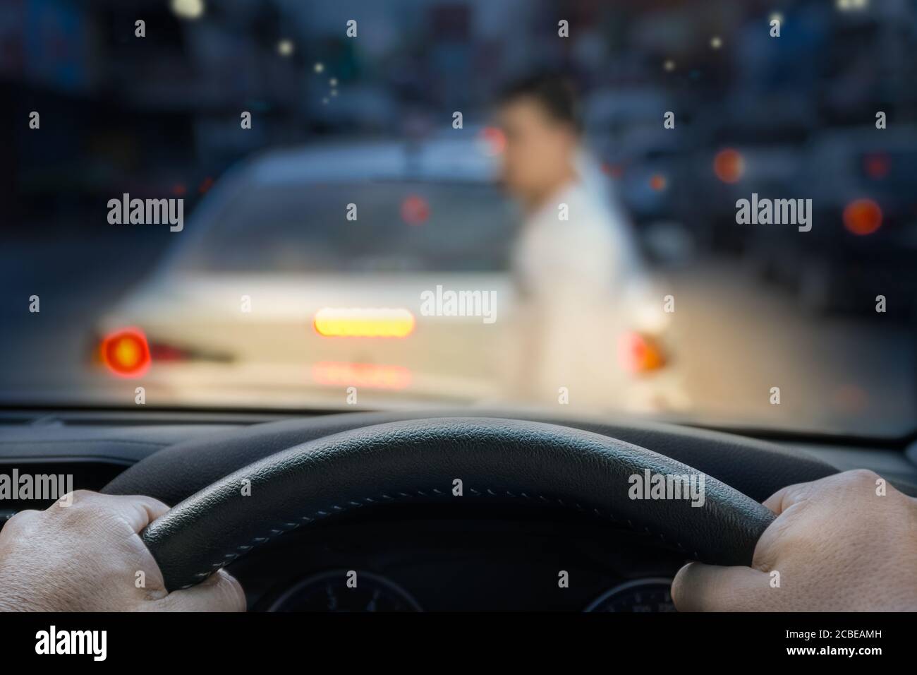 car emergency brake saved a life pesdestrian runs across street Stock