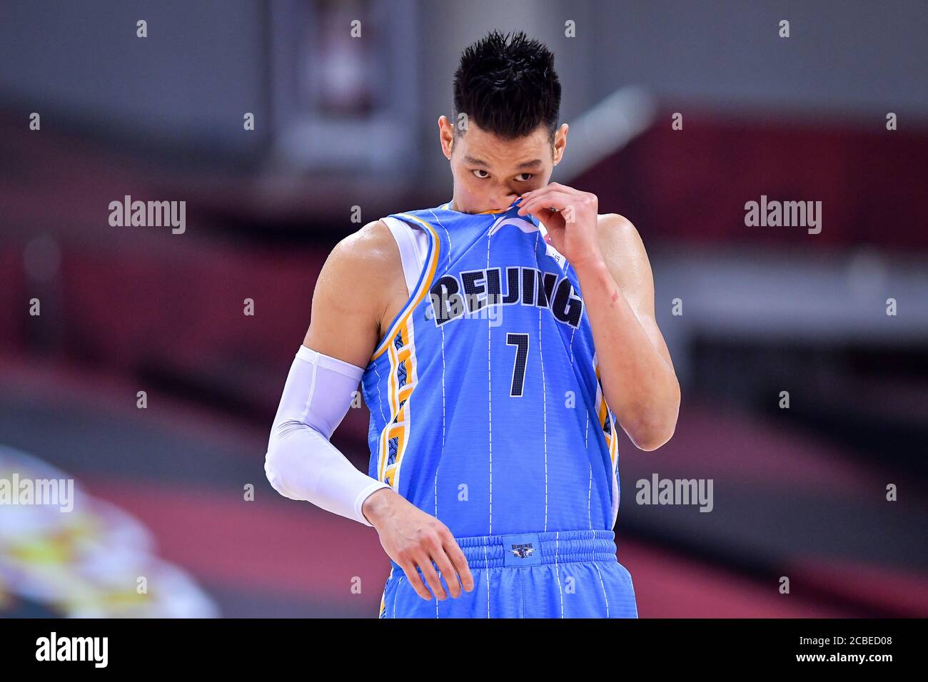 American professional basketball player Jeremy Lin for the Beijing Ducks of the Chinese Basketball Association (CBA) bleeds as he gets hurt during a playoff game against Guangdong Hongyuan Southern Tigers, Qingdao city, east China's Shandong province, 8 August 2020. Stock Photo