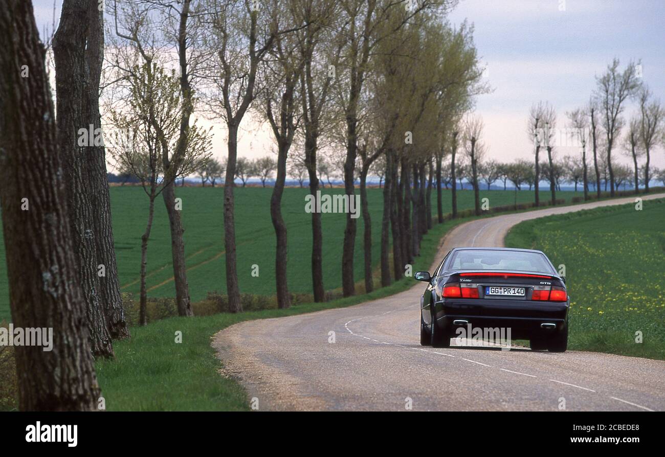 1998 Cadillac STS driving in Northern France Stock Photo