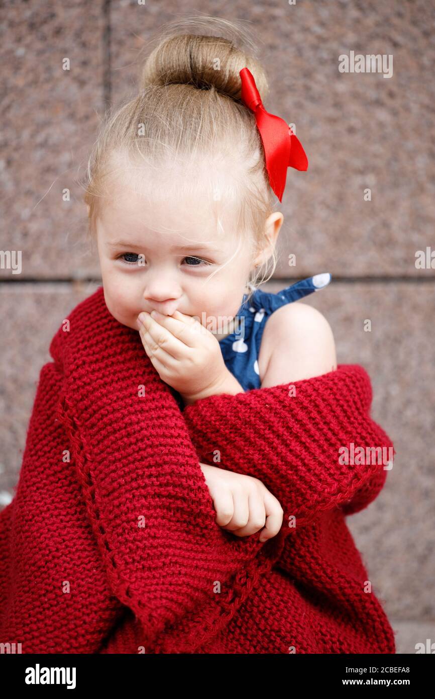 little girl laughs in her palm Stock Photo Alamy