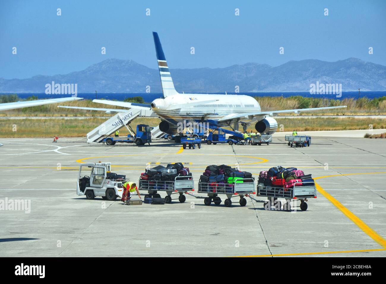RHODES, GREECE - JULY 18, 2016 : Privilege Style spanish airline plane load in Rhodes island in Greece. Stock Photo