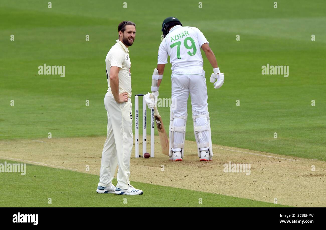 England's Chris Woakes reacts as Pakistan's Azhar Ali knocks away a ball that came to a stop just short of the stumps during day one of the Second Test match at the Ageas Bowl, Southampton. Stock Photo