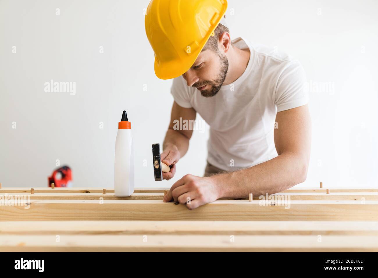Male carpenter working on a project in his workshop Stock Photo
