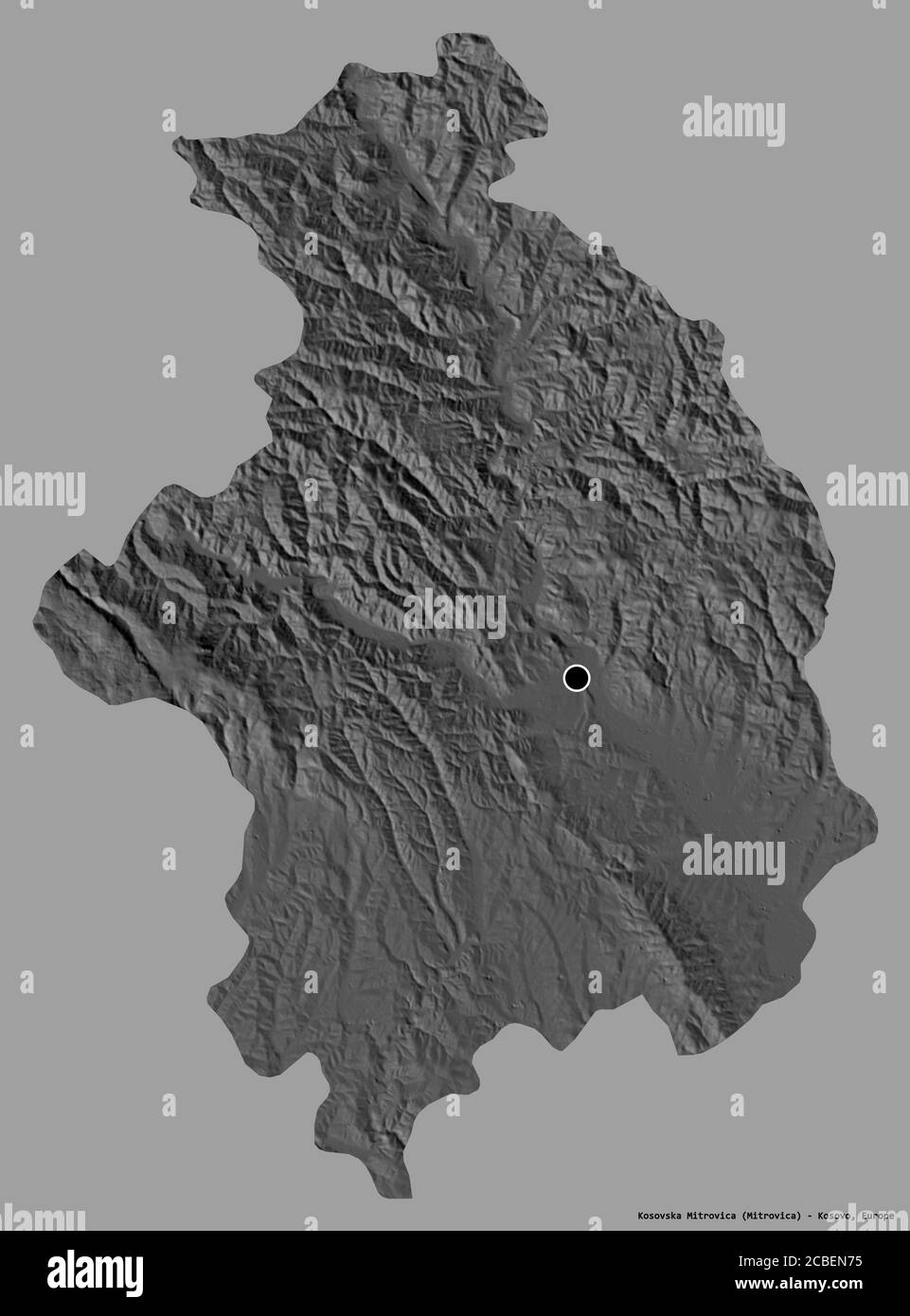 Shape of Kosovska Mitrovica, district of Kosovo, with its capital isolated on a solid color background. Bilevel elevation map. 3D rendering Stock Photo