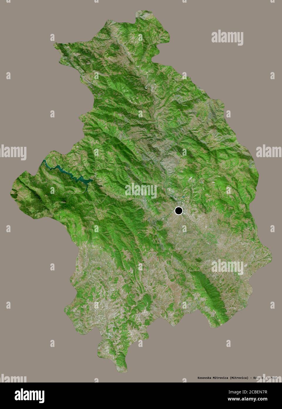 Shape of Kosovska Mitrovica, district of Kosovo, with its capital isolated on a solid color background. Satellite imagery. 3D rendering Stock Photo