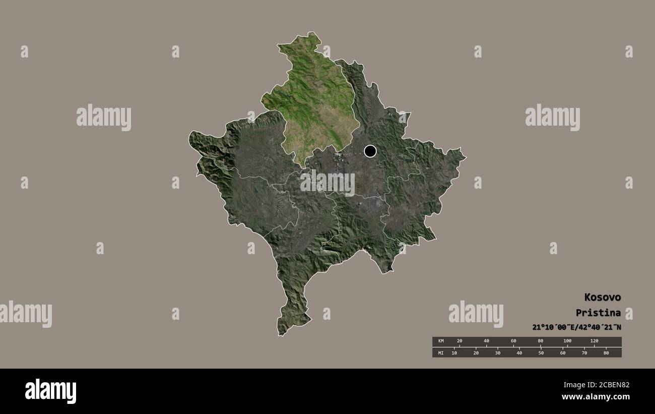 Desaturated shape of Kosovo with its capital, main regional division and the separated Kosovska Mitrovica area. Labels. Satellite imagery. 3D renderin Stock Photo