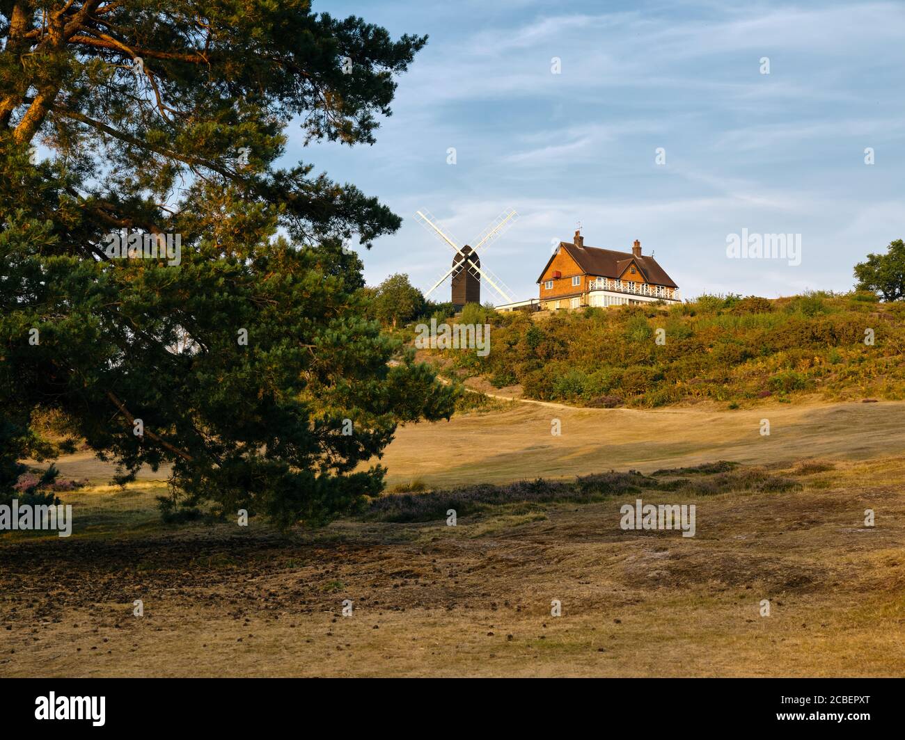 Reigate Heath Windmill Chapel and Golf Clubhouse in the summer