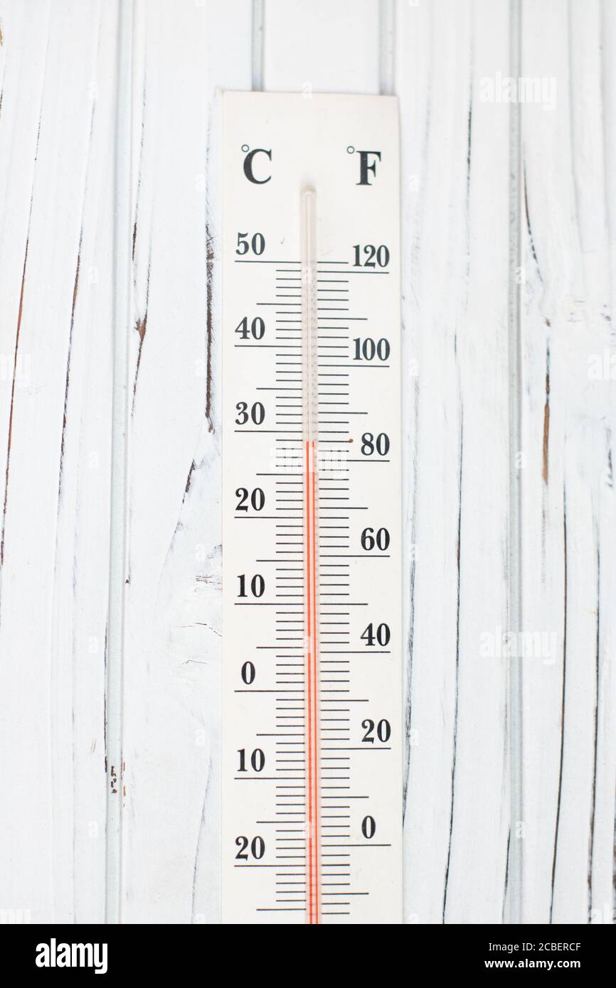 Wooden thermometer outside temperature Stock Photo by ©Egor_1896 247566650