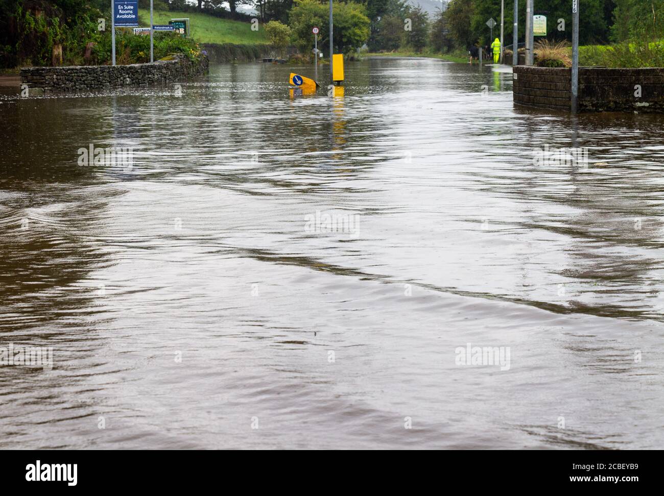 Flooded Road caused by torrential rain, Rosscarbery, West Cork, Ireland Stock Photo