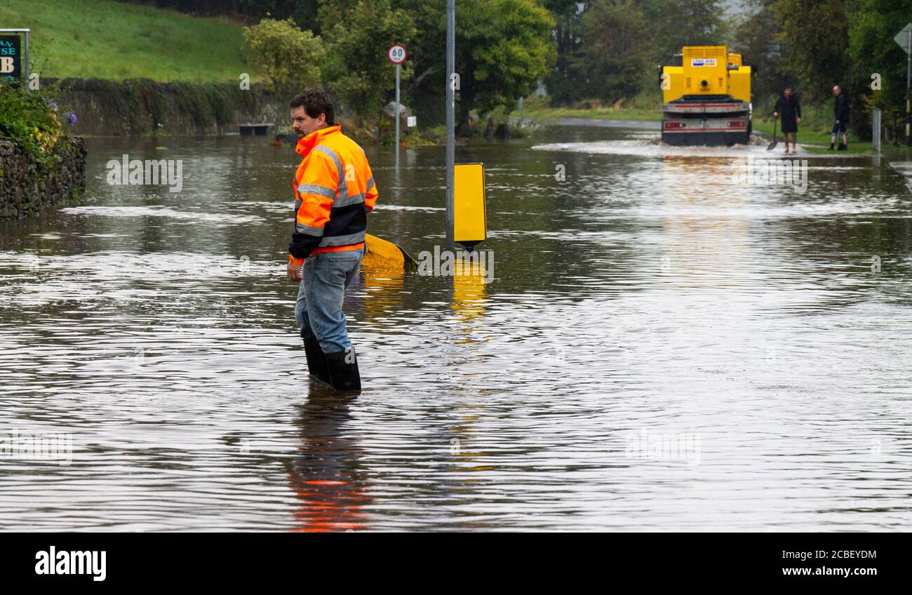 Flooded Road caused by torrential rain, Rosscarbery, West Cork, Ireland Stock Photo