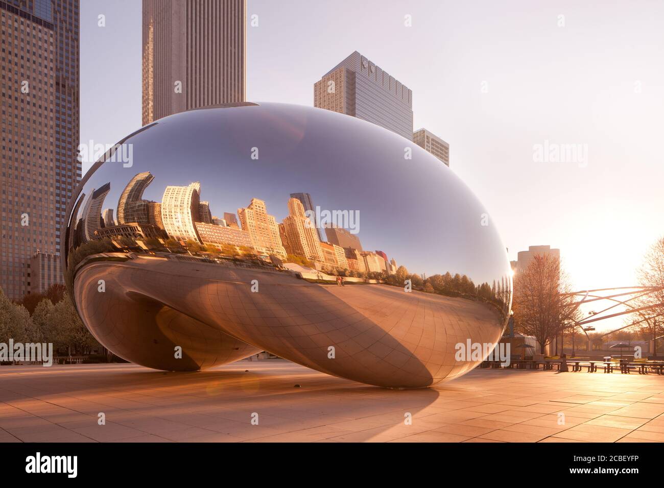 Chicago, Illinois, United States - Millennium Park and city skyline reflected on Cloud Gate. Stock Photo