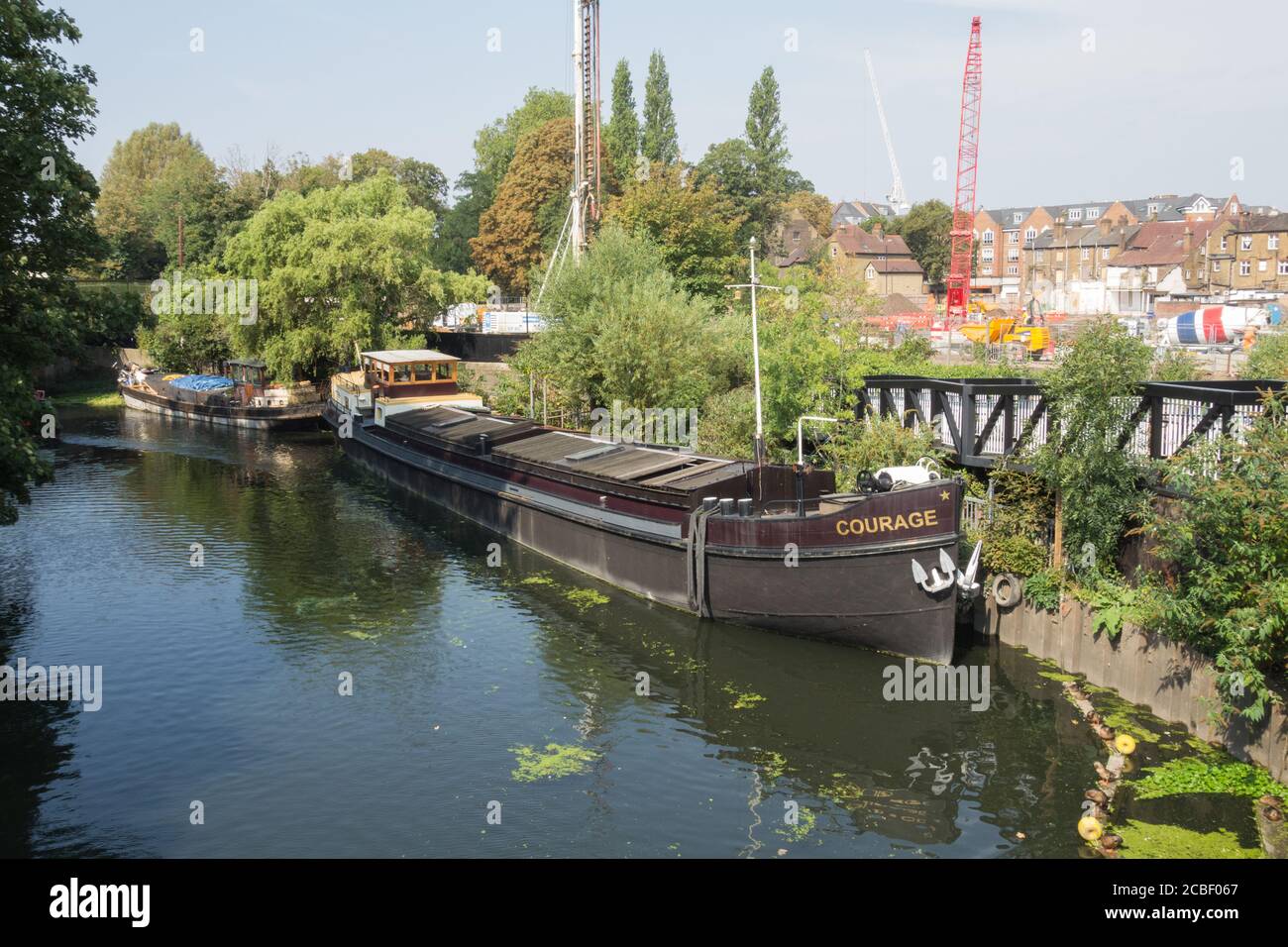 A Dutch Barge houseboat on the Grand Union Canal near Brentford Dock, Brentford, Middlesex, UK Stock Photo