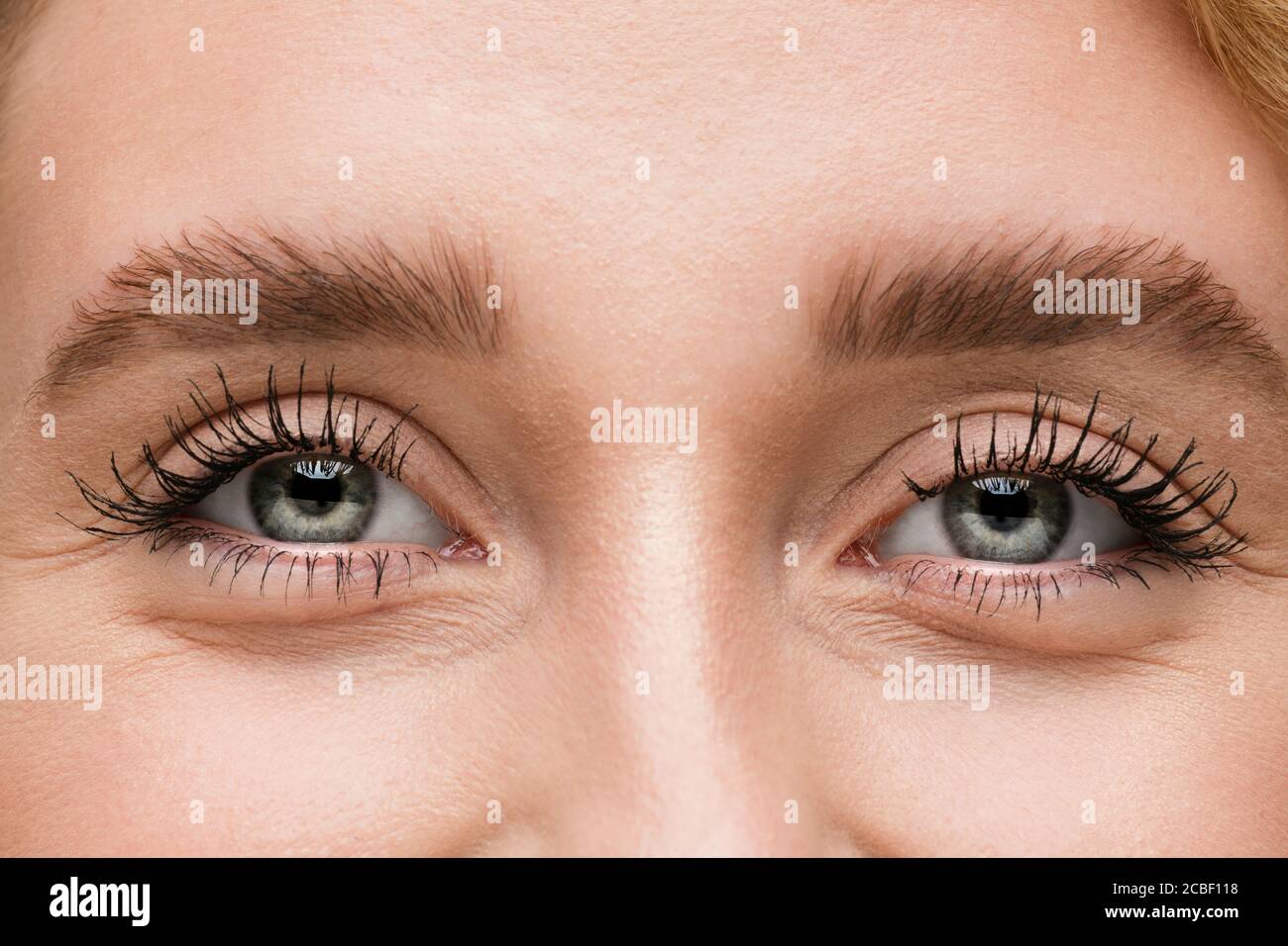 Laughting. Close up of face of beautiful caucasian young woman, focus ...