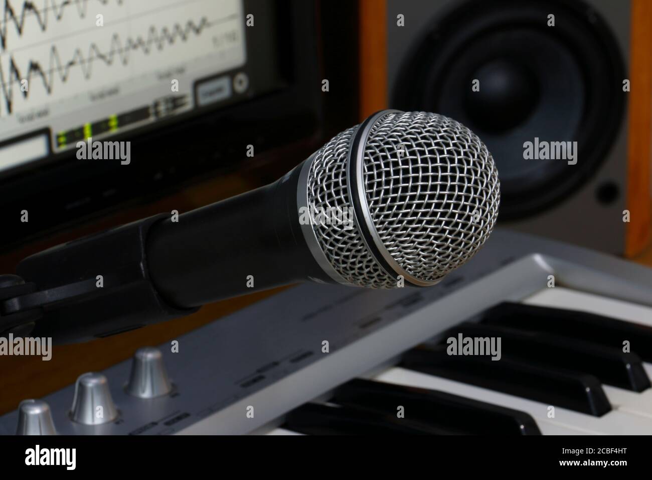 home recording studio. Screen keyboard, speakers and microphone. Stock Photo