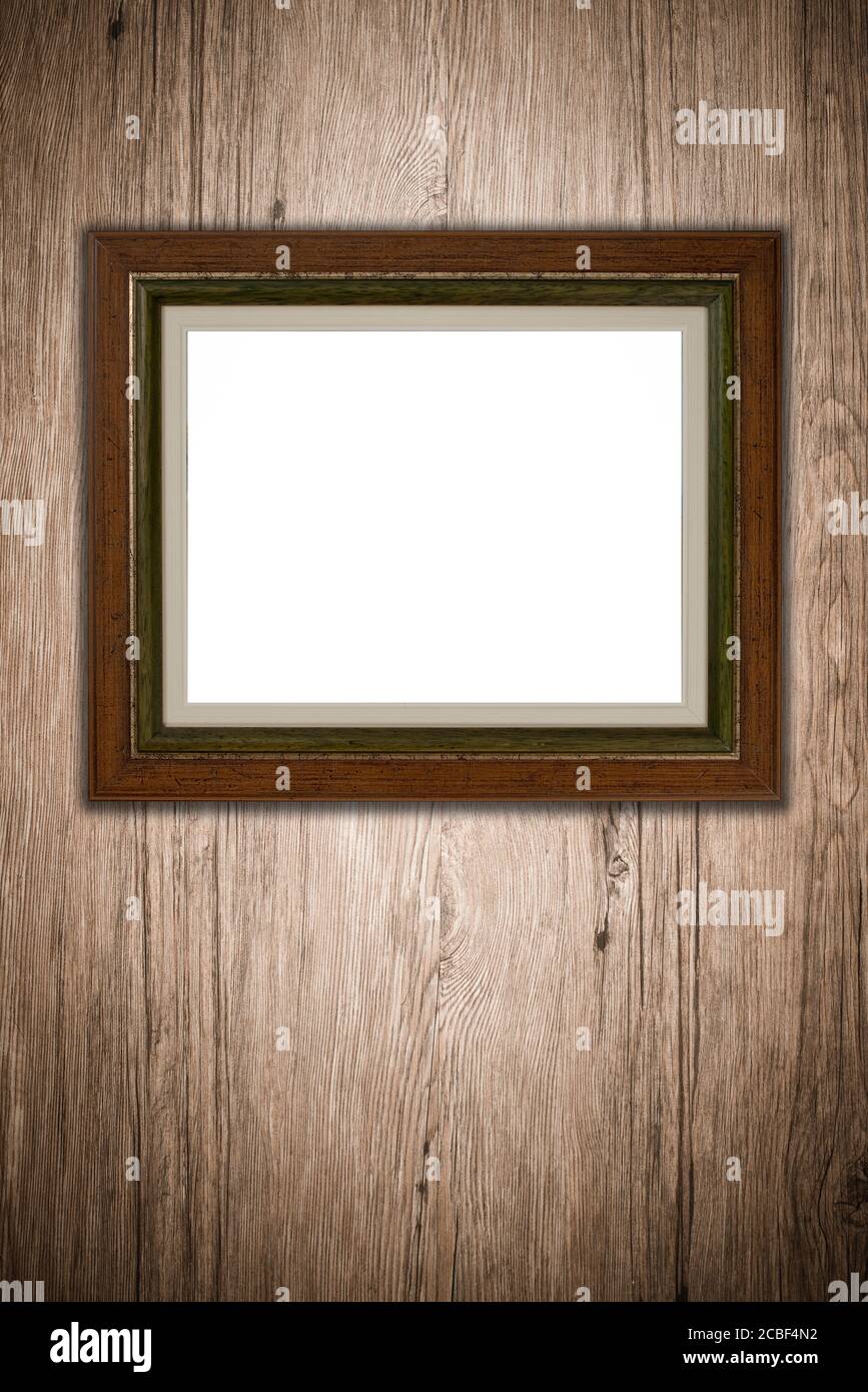 Old picture frame on vintage wood wall Stock Photo - Alamy