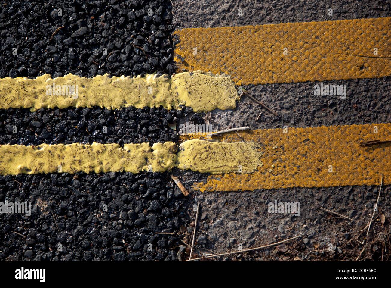 A close up of double yellow line kerbside road markings Stock Photo Alamy