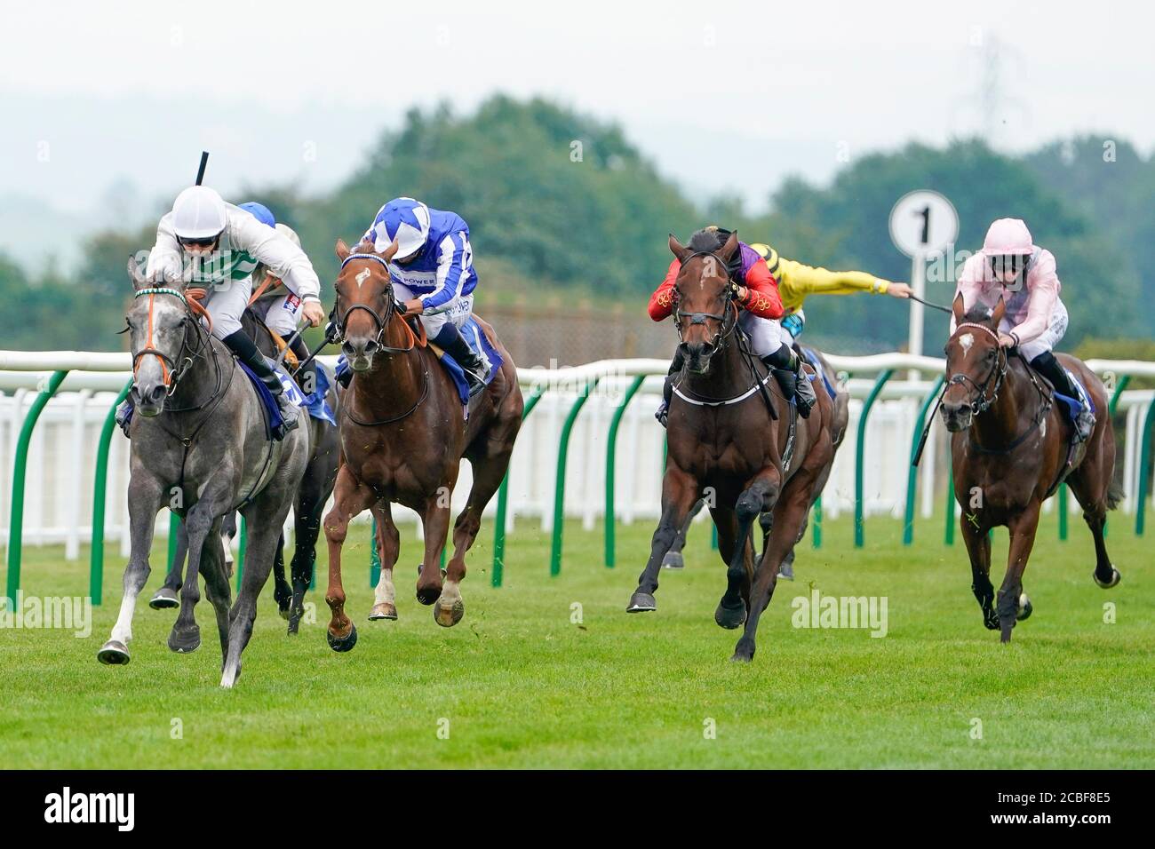 Ryan Tate riding Alpinista (left) wins The British Stallion Studs EBF Upavon Fillies' Stakes at Salisbury Racecourse on August 13, 2020 in Salisbury, England. Owners are allowed to attend if they have a runner at the meeting otherwise racing remains behind closed doors to the public due to the Coronavirus pandemic. (Photo by Alan Crowhurst/Getty Images) at Salisbury Racecourse, Wiltshire. Stock Photo