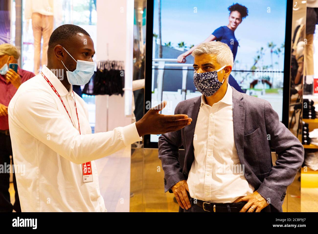 Mayor of London Sadiq Khan in Uniqlo, Oxford Street, London, where he visited shops and restaurants to find out how they are coping after he sent a letter to the Prime Minister on the huge challenges currently being faced by West End businesses. Stock Photo