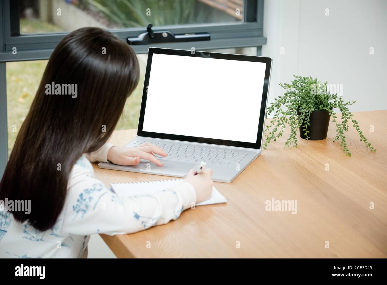 Child Uses a Computer for School Work Stock Photo Alamy