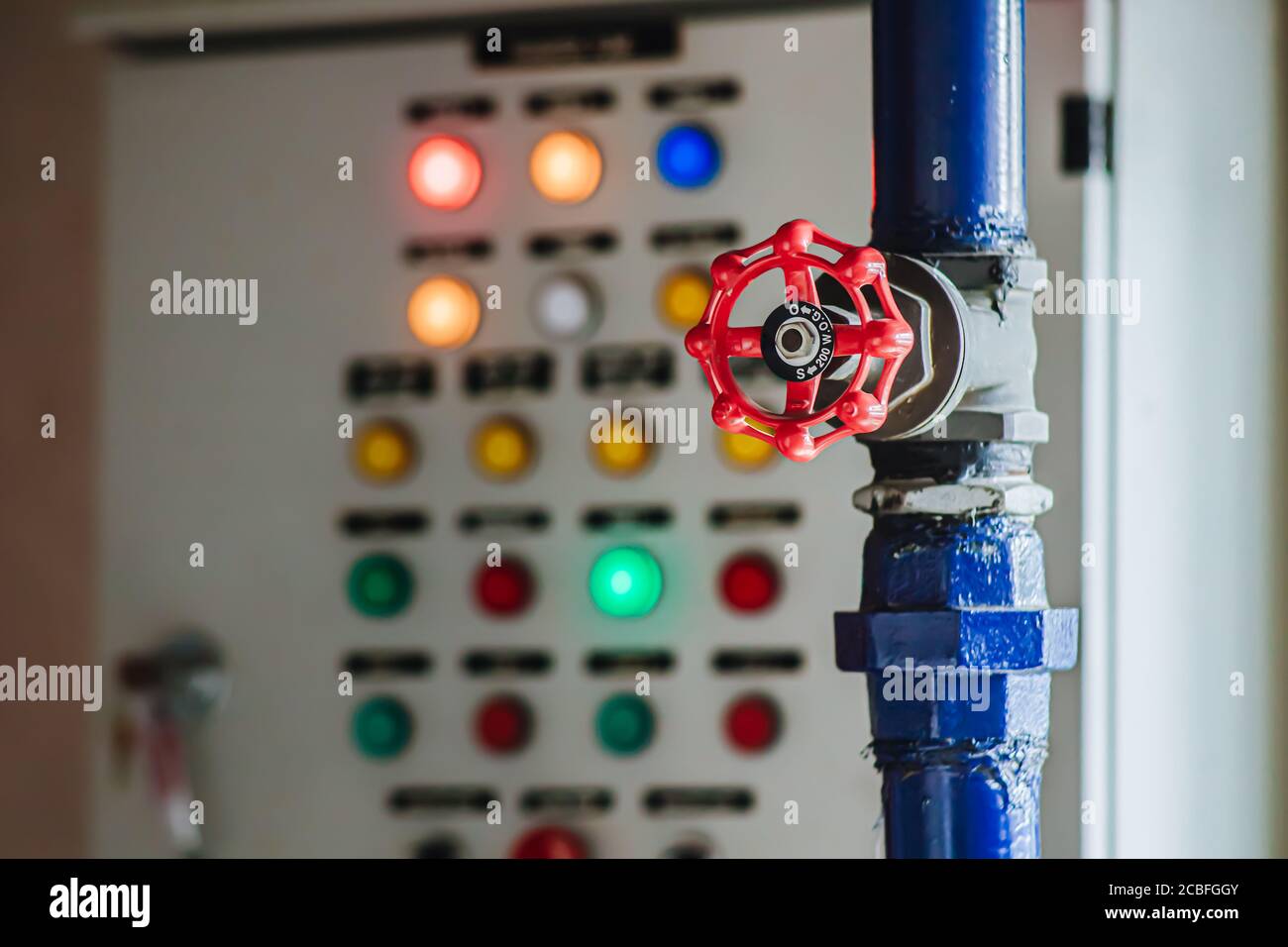 water oil gas valve with pump control panel background Stock Photo