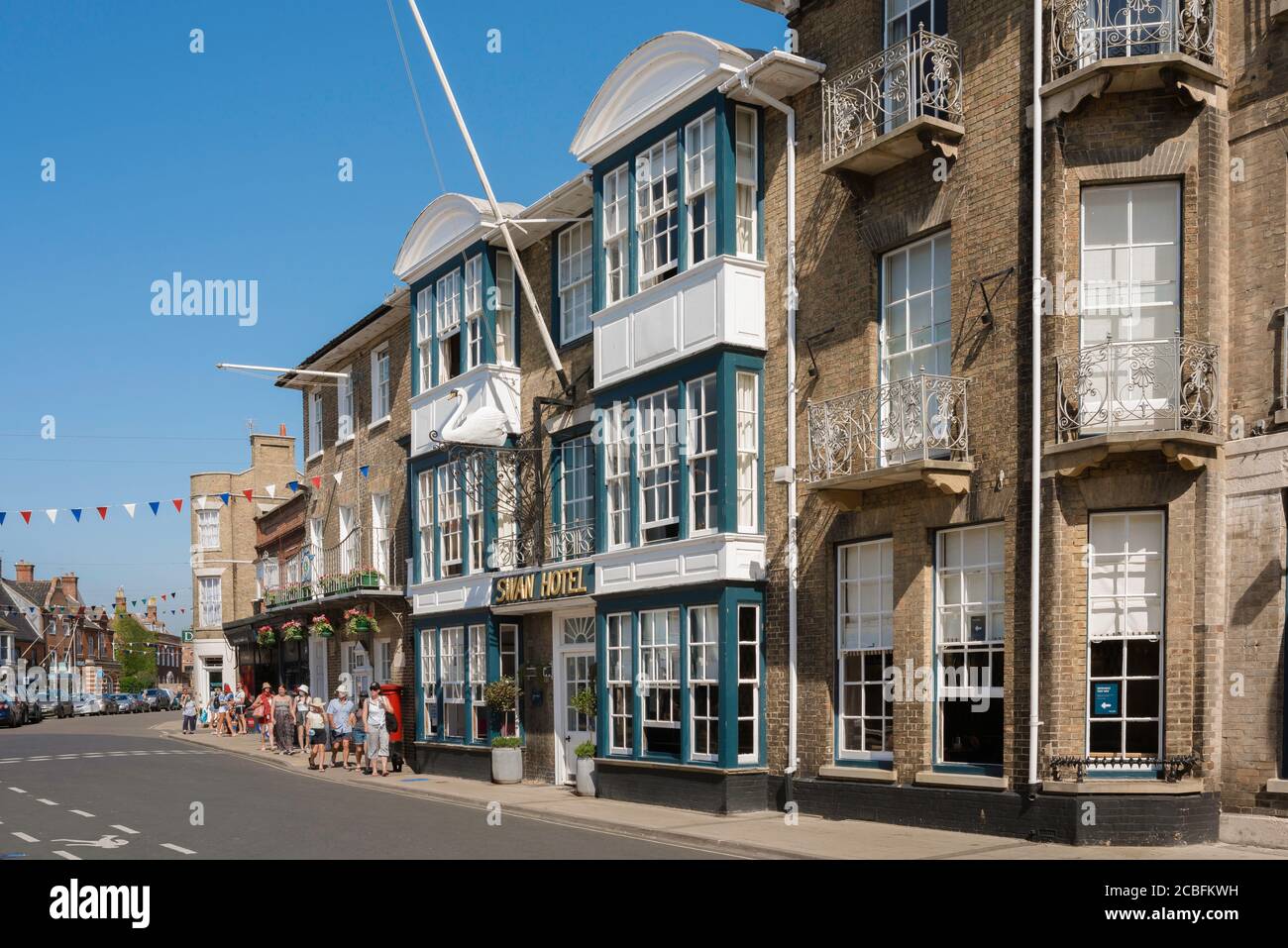 Southwold Suffolk, view in summer of people walking in the High Street in the centre of the coastal resort town of Southwold, Suffolk, East Anglia, UK Stock Photo