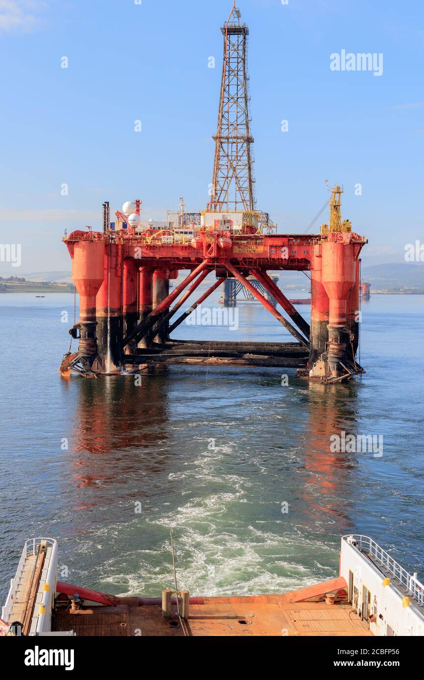 INVERGORDON, SCOTLAND - 2016 OCTOBER 7. AHTS vessel doing Rig Move Operation with the oil rig Borgsten Dolphin. Stock Photo