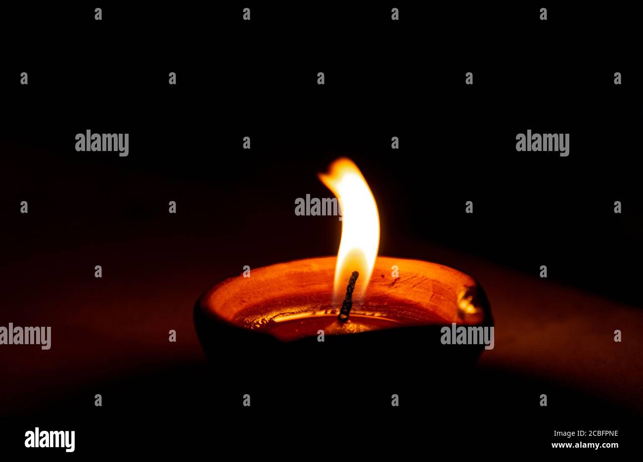 Diya (Candle Light brightening in the festival of Diwali Stock Photo