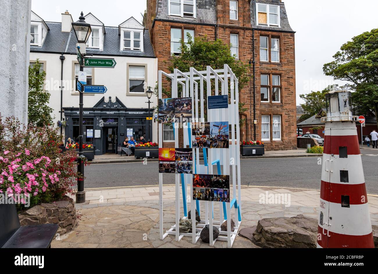 North Berwick, East Lothian, Scotland, United Kingdom, 13th August 2020. Covid-19 effects: A display of photographs of previous Fringe-by-the-Sea reminds visitors of the cancellation of this year's festival which would have been on at the moment Stock Photo