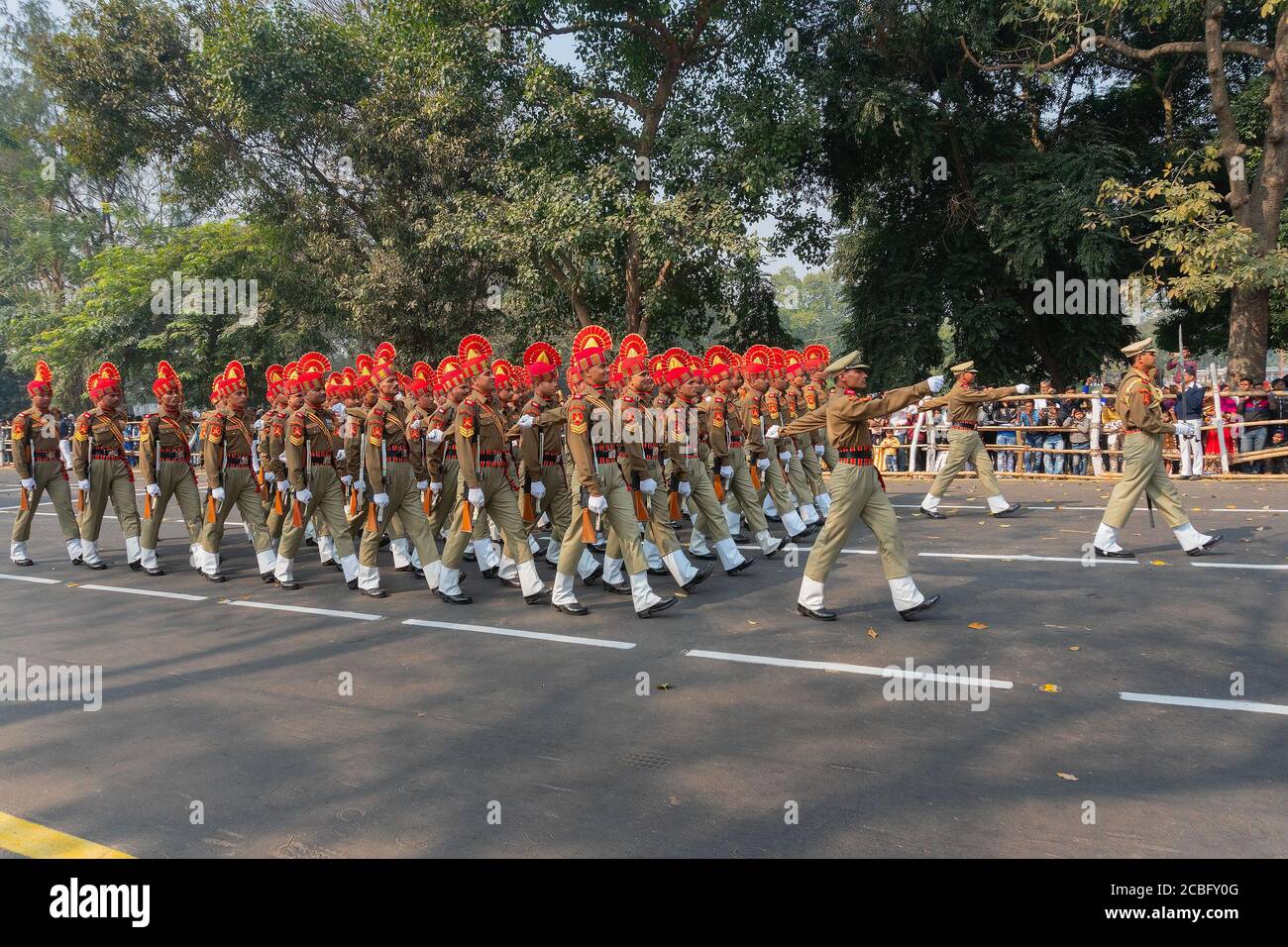 Kolkata, West Bengal, India - 26th Januaray 2020 : Indian armed force Officers wearing bright red hats are marching past with rifles, at Republic day Stock Photo