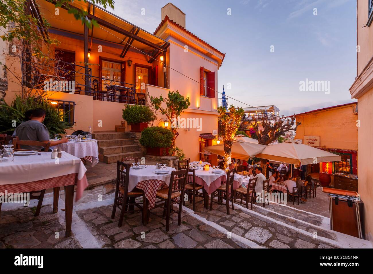 People in a taverna in Plaka, the old town of Athens, Greece. Stock Photo