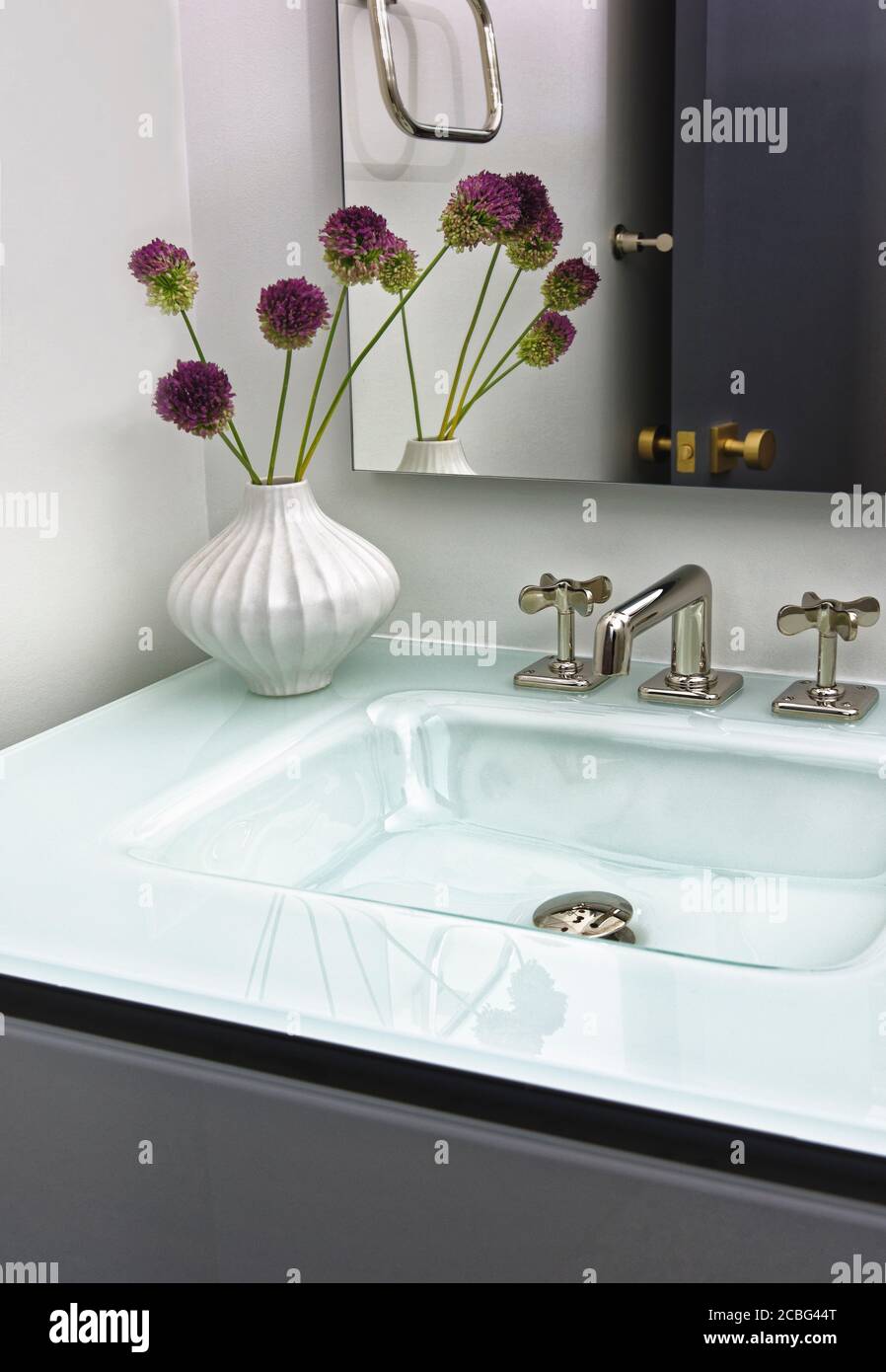 Bathroom Vanity Glass countertop and sink Stock Photo
