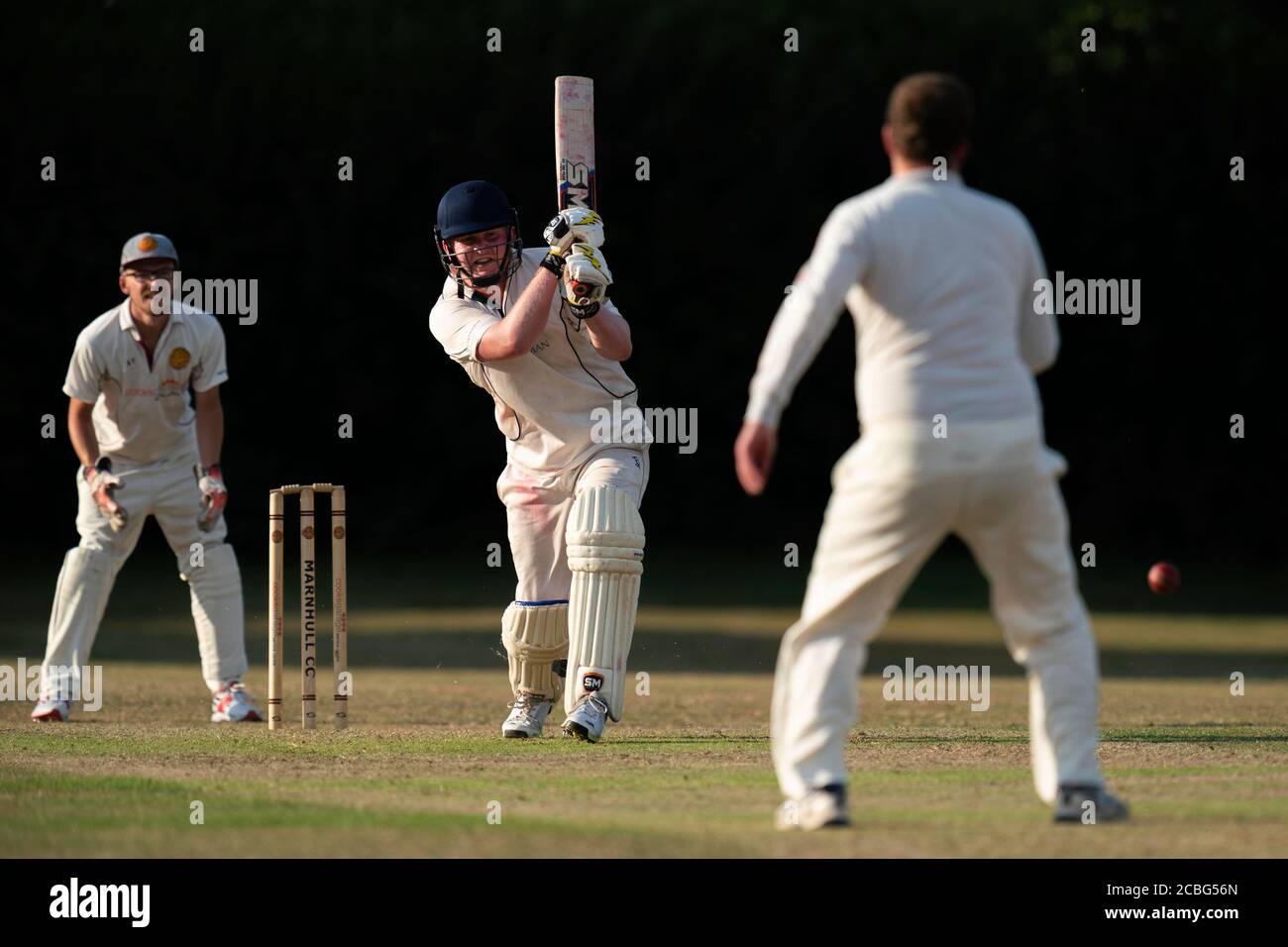 Batsman in action Stock Photo