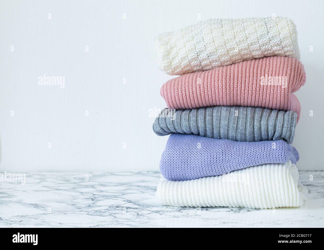 pastel color sweaters