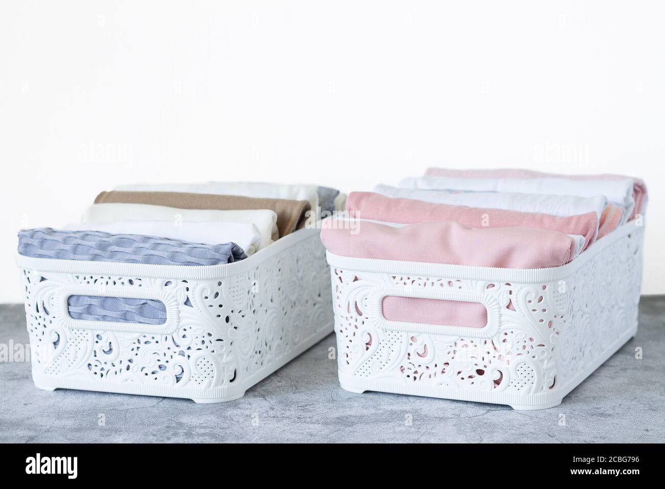 Clothing neatly folded by method vertical storage KonMari. Two