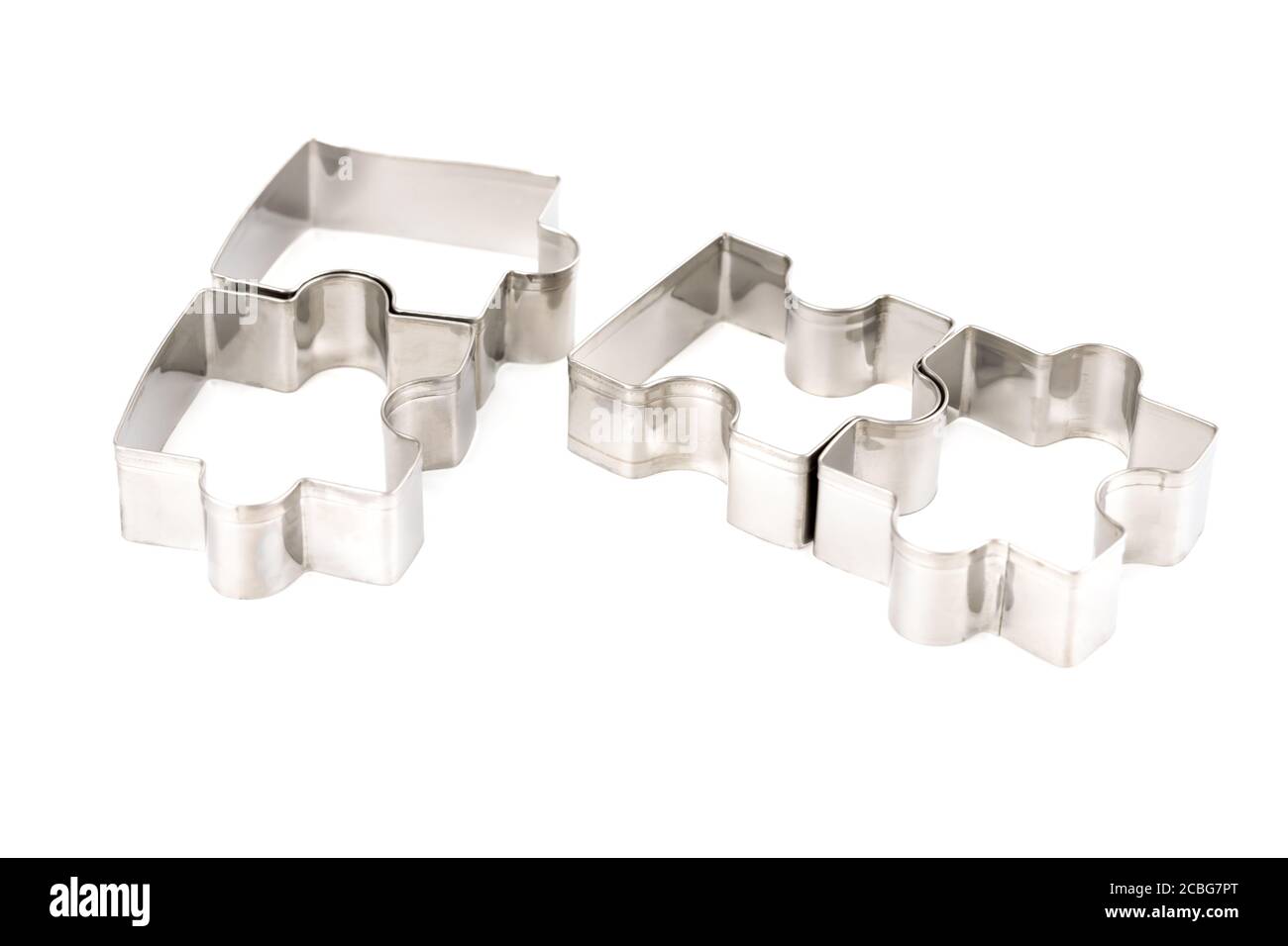 Puzzle baking molds isolated on white background Stock Photo Alamy