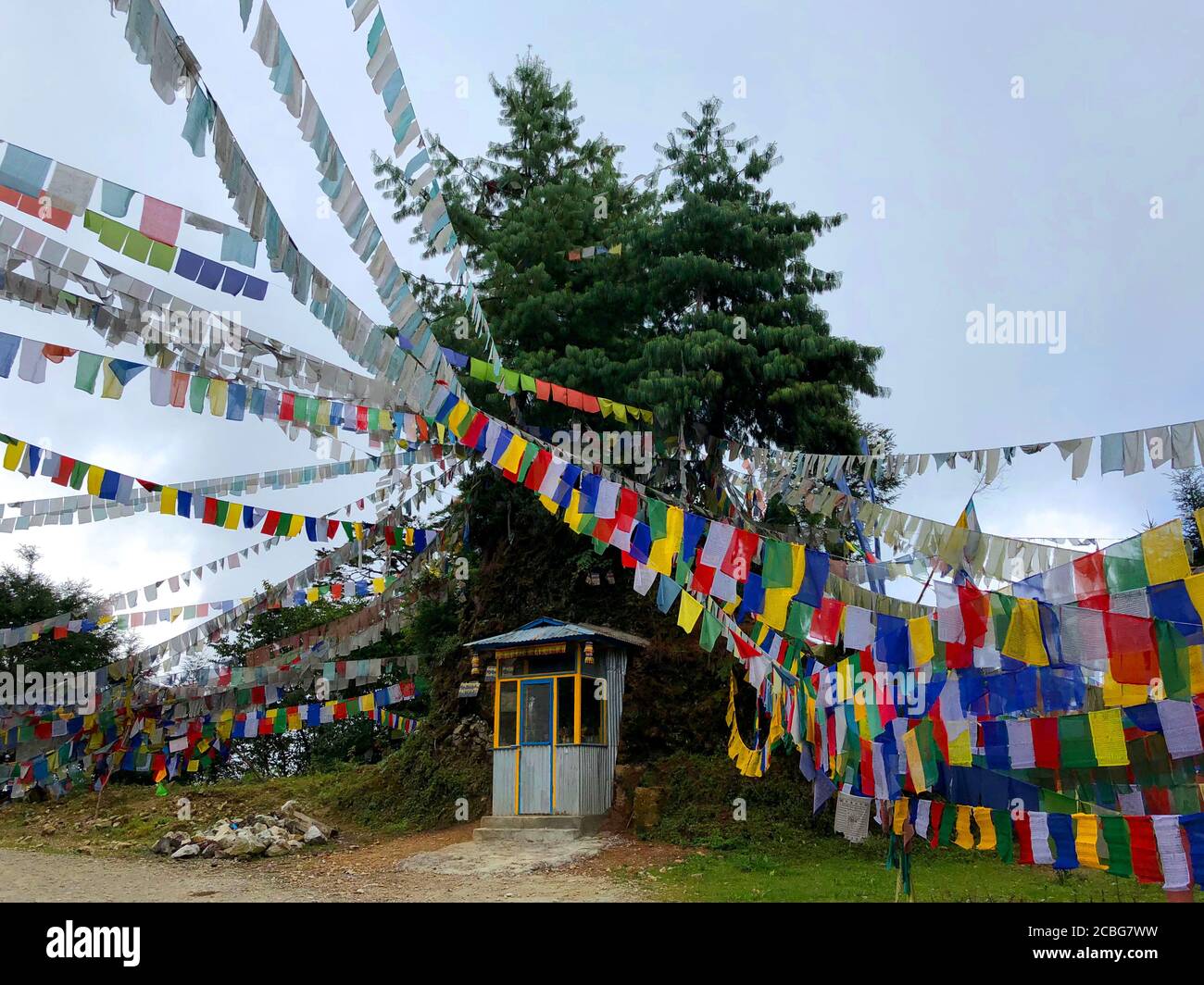 Prayer flags with mantras and prayers (for liberation from suffering, for long life, for compassion) that are carried when tossed about by the wind. Stock Photo