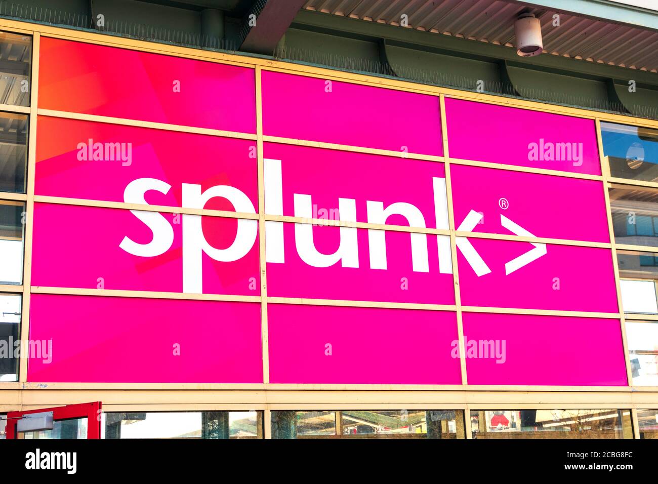 Large Splunk sign on outdoor billboard advertising. Splunk Inc produces software for searching, monitoring, and analyzing machine-generated big data - Stock Photo