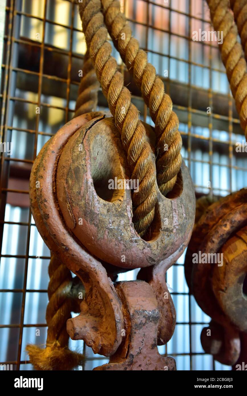 Traditional old wooden rigging block used on tall ship Stock Photo
