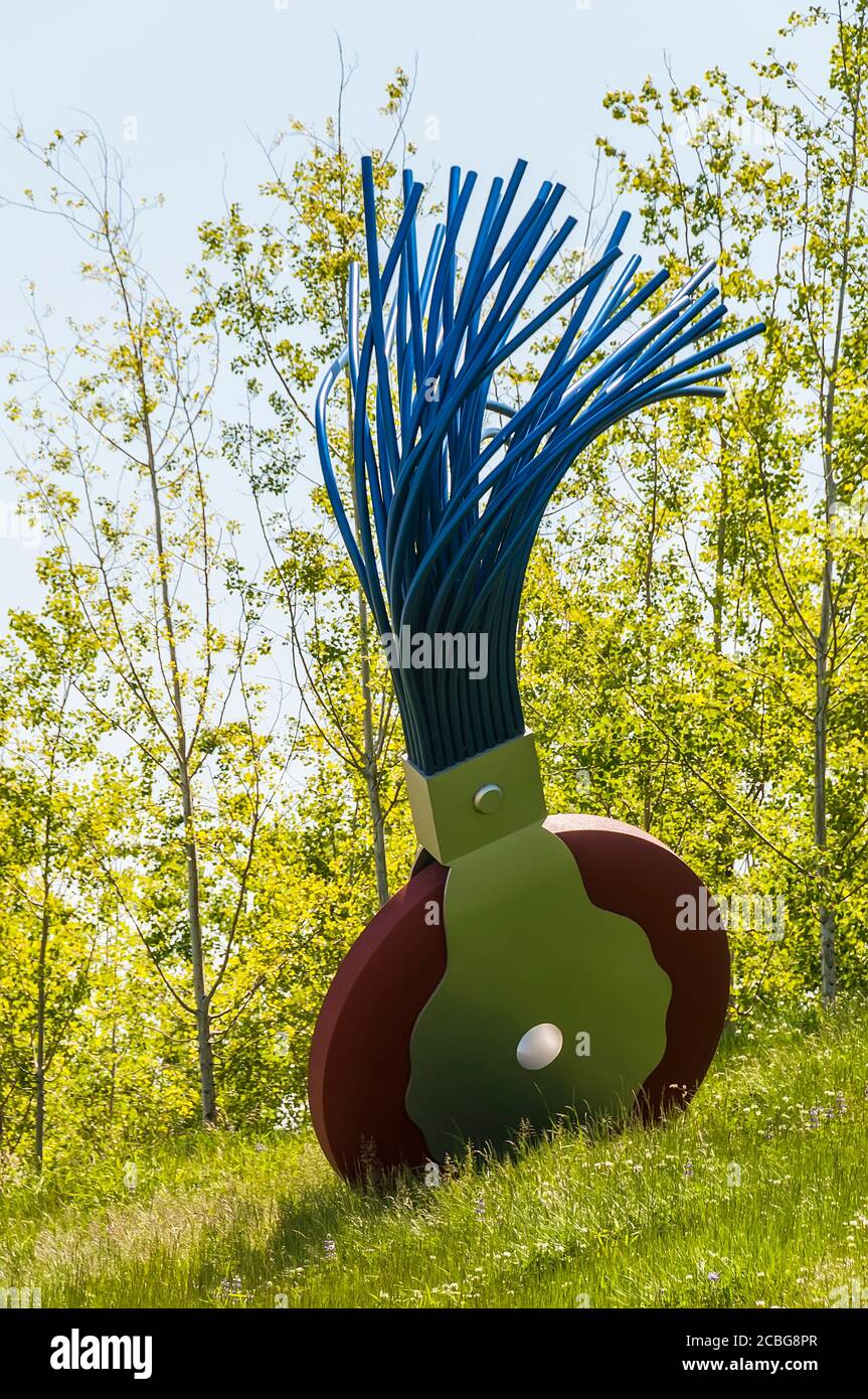 Large sculpture of wheel typewriter eraser with brush in Olympic