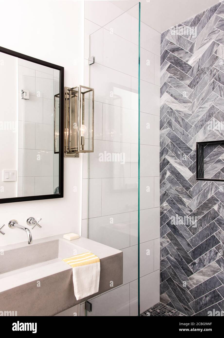 Bathroom with Herringbone Marble tile shower Stock Photo Alamy