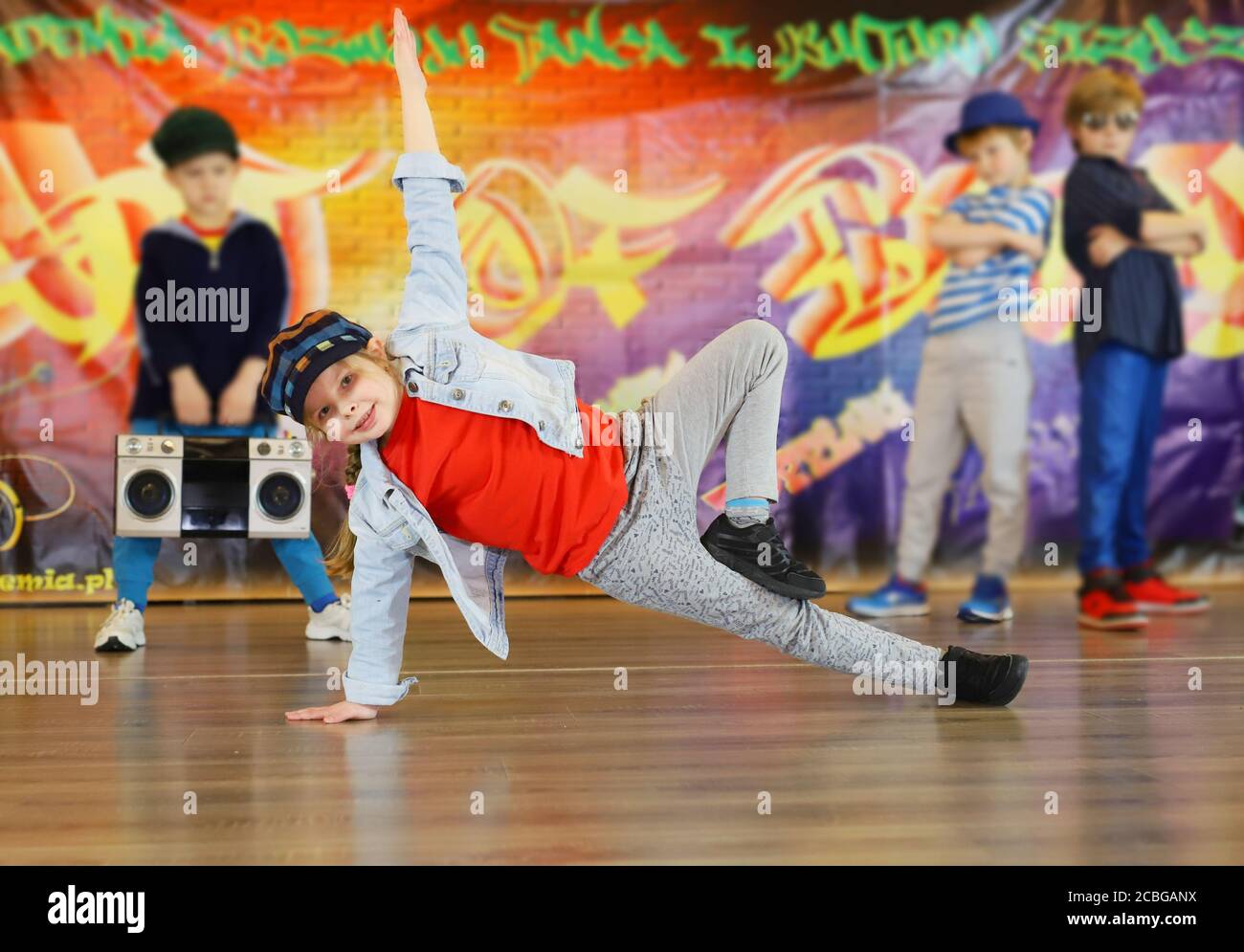 little girl in a unique breakdance position Stock Photo