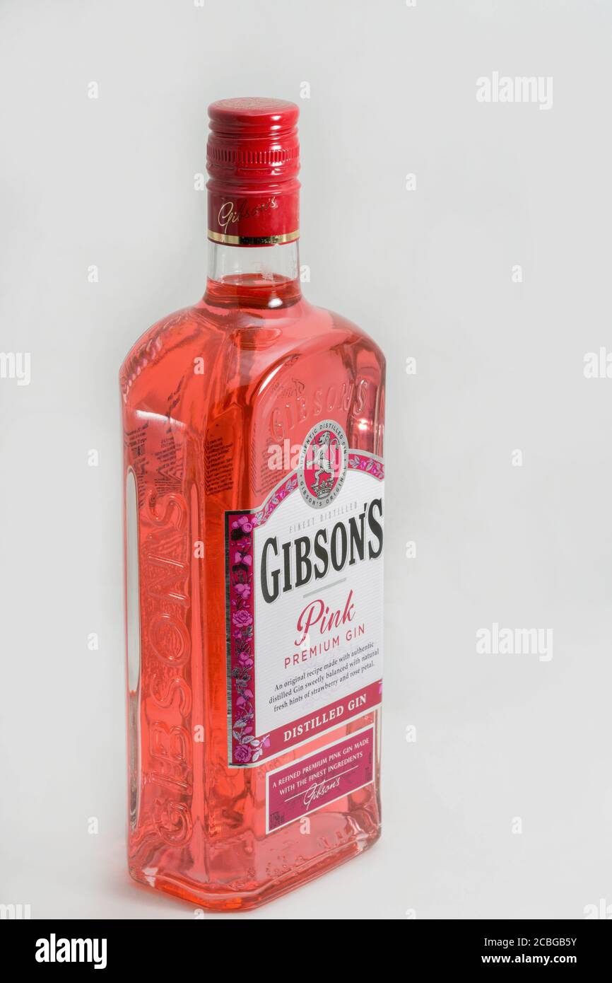 KYIV, UKRAINE - MARCH 28, 2020: Gibsons premium pink gin bottle half turned  closeup against white background. Gin is a distilled alcoholic drink that  Stock Photo - Alamy