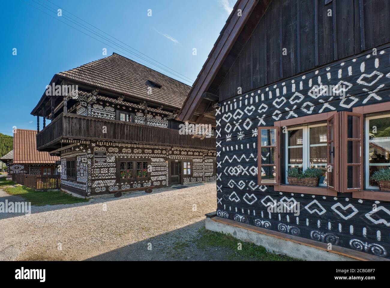 Decorated wooden houses in village of Cicmany, Strážov Mountains, Zilina Region, Slovakia Stock Photo