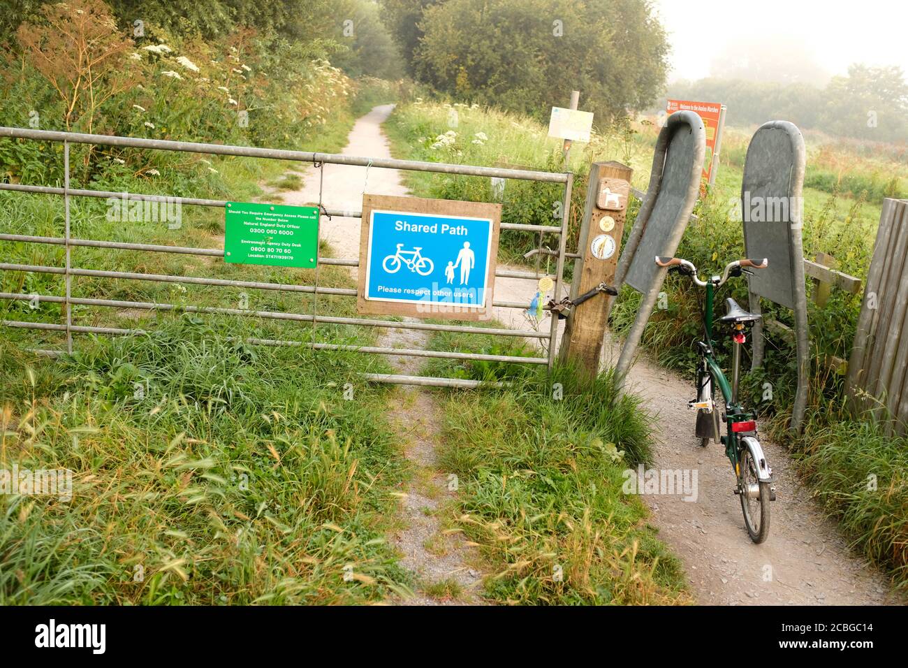 August 2020 - British folding Brompton bike on trails near Glastonbury. Stock Photo