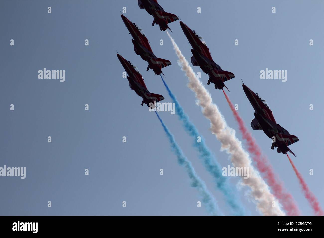 13 August 2020 RAF Valley the Red Arrows.   Red arrows put on a incredible display at RAF Valley , The Red Arrows aerobates team are flying over North Wales. The team will conduct a training rehearsal from RAF Valley on Anglesey ahead of a number of fly-pasts this weekend for Victory in Japan day service  Credit : Mike Clarke / Alamy Live News Stock Photo